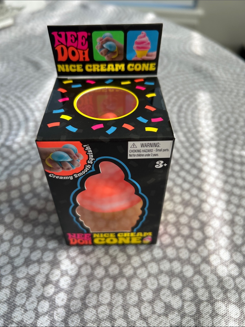 NEW NeeDoh Nice Cream Cone Squeeze Toy - Orange, brand new in box